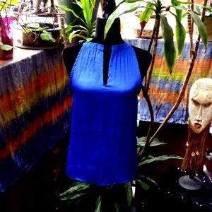 Jennifer Lopez short sleeve blouse.